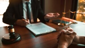 Lawyer is providing information about the client's trial at the lawyer office