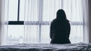 Woman experiencing emotional distress after an injury
