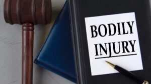 Bodily Injury Legal Term On Law Book And Gavel